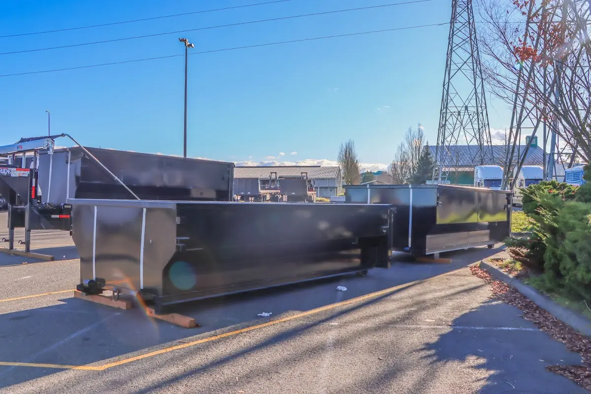 Roll-off dumpster ready for waste disposal at job site for Concrete Dumpster Rental in Ellicott